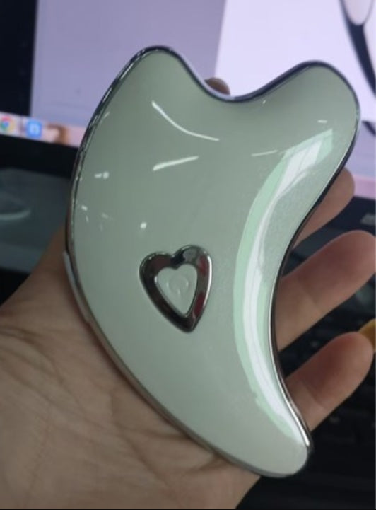 Masajeador Facial Gua Sha con Luz LED y Microcorriente